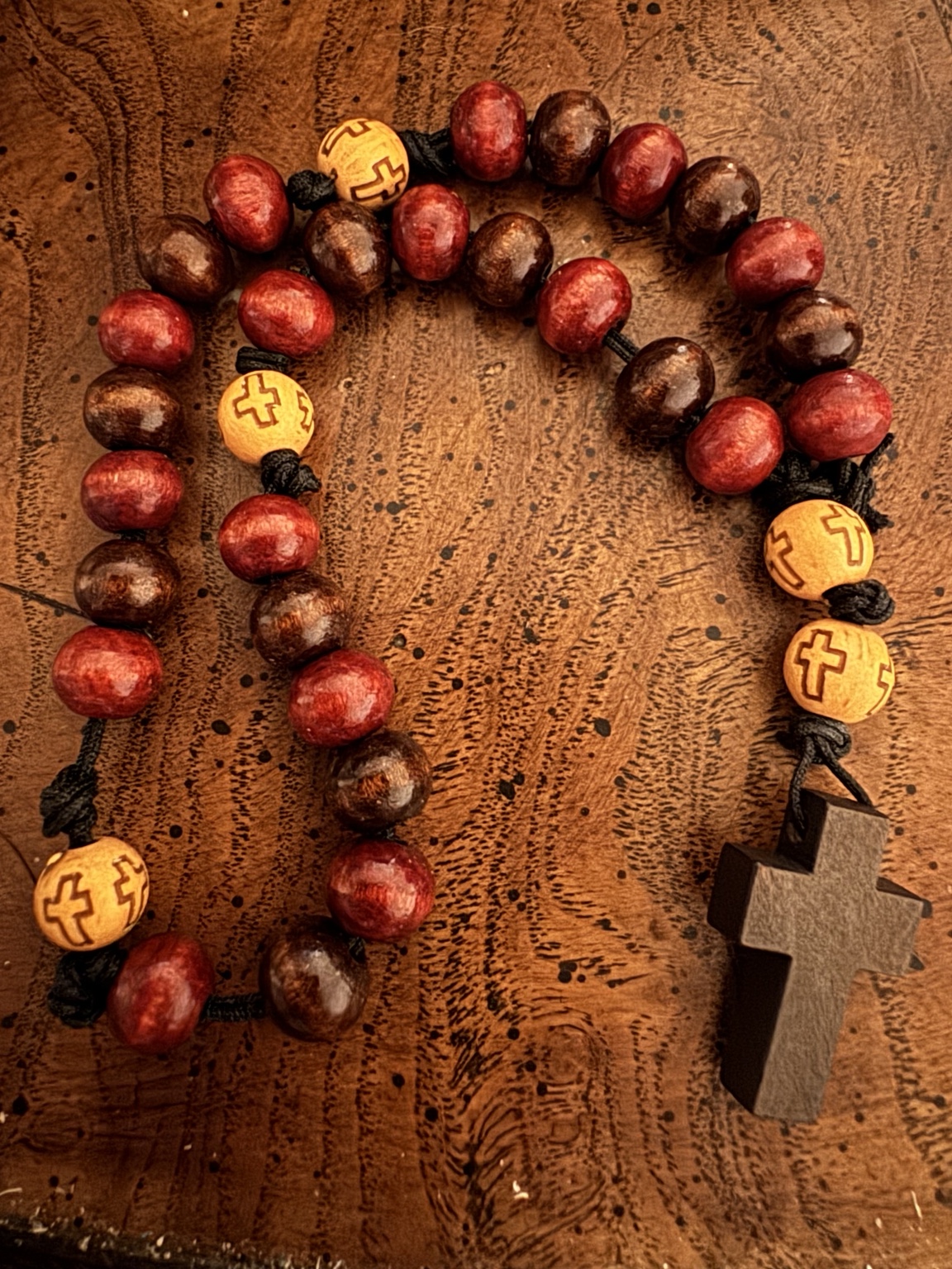Red and brown handmade Anglican rosary with wooden cross
