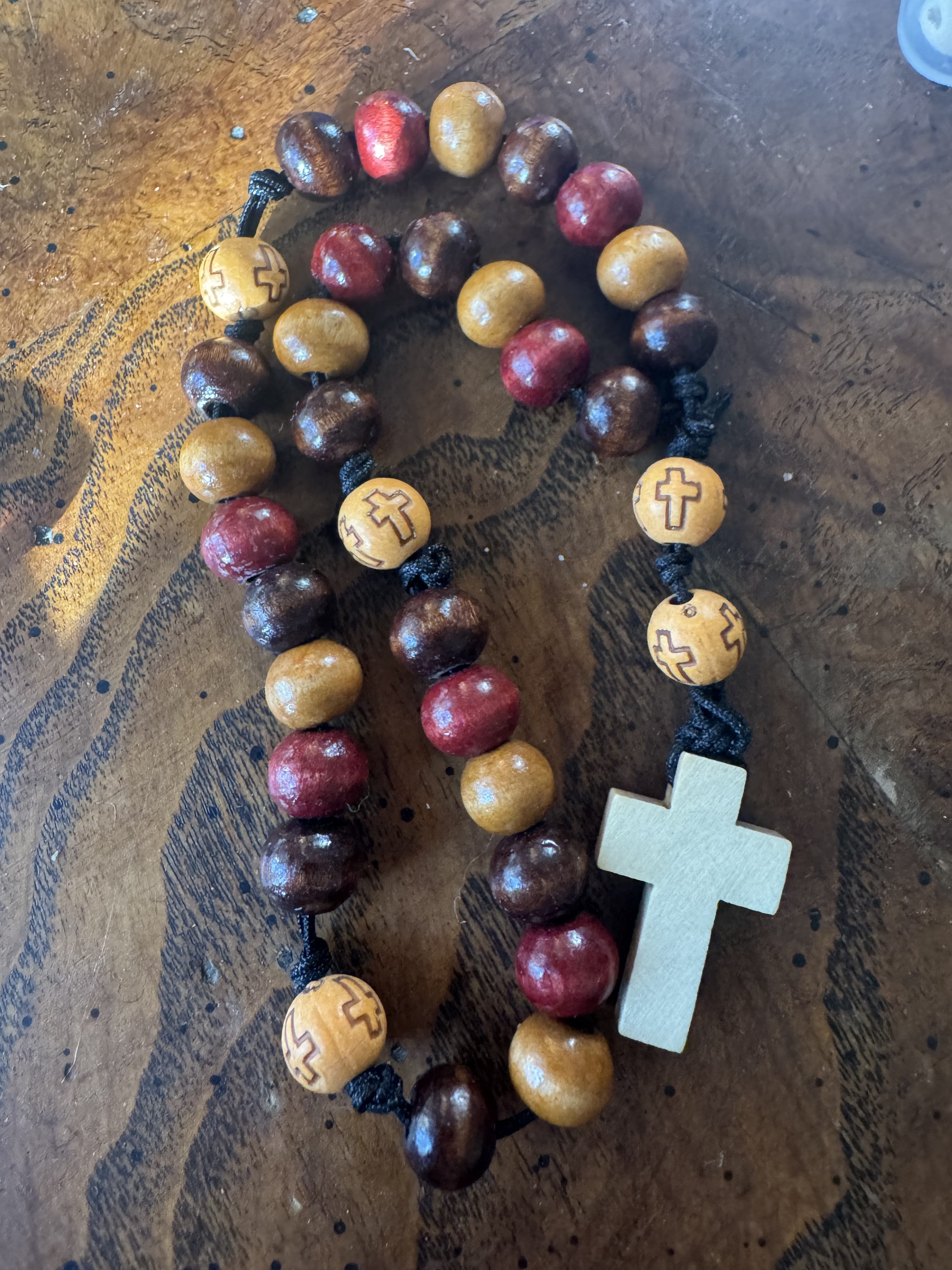 Red, brown, and natural wood handmade Anglican rosary with wooden cross